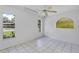 Well-lit bedroom with three windows and neutral tones throughout the space at 380 Violet Dell Dr, Casselberry, FL 32707