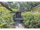 Landscaped walkway leading to the double front doors with a covered entrance way at 380 Violet Dell Dr, Casselberry, FL 32707