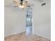 Spacious empty living room with tile flooring, neutral paint, and a ceiling fan at 380 Violet Dell Dr, Casselberry, FL 32707