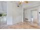 An expansive empty living room with tile flooring and neutral paint throughout at 380 Violet Dell Dr, Casselberry, FL 32707