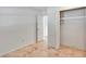 Empty room with tile flooring, closet, and a white painted door at 380 Violet Dell Dr, Casselberry, FL 32707