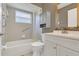 Bathroom featuring bathtub and shower combination and updated vanity at 4018 August Ct, Casselberry, FL 32707