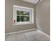 Bonus room featuring tiled floors and natural light from the window at 4018 August Ct, Casselberry, FL 32707