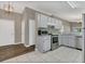 Bright kitchen features stainless steel appliances and lots of cabinet space at 4018 August Ct, Casselberry, FL 32707
