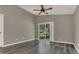 Main bedroom with hardwood floors and a fan at 4018 August Ct, Casselberry, FL 32707