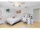 Bright bedroom with a ceiling fan and a well-lit vanity at 4478 Yachtmans Ct, Orlando, FL 32812