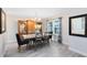 The dining room features a large window that lets in plenty of natural light at 4478 Yachtmans Ct, Orlando, FL 32812