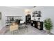 Bright home office featuring modern desk and shelves at 4478 Yachtmans Ct, Orlando, FL 32812