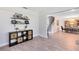 Hardwood floors in open living room and dining room featuring a staircase in view at 4478 Yachtmans Ct, Orlando, FL 32812