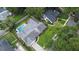 Aerial view of a home with a swimming pool and large backyard, with mature trees providing shade and privacy at 448 Stonewood Ln, Maitland, FL 32751