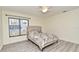 Bedroom with laminate flooring, natural light from window, and neutral decor at 448 Stonewood Ln, Maitland, FL 32751
