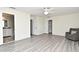 Spacious bedroom showcasing doors to bathroom and closet, and light gray floors at 448 Stonewood Ln, Maitland, FL 32751