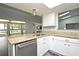 Open concept kitchen with granite countertops, stainless steel appliances, and a breakfast bar at 448 Stonewood Ln, Maitland, FL 32751