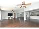 Spacious living room with hardwood floors, recessed lighting, and easy access to kitchen at 448 Stonewood Ln, Maitland, FL 32751