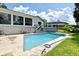 In-ground swimming pool with backyard patio and green grass at 448 Stonewood Ln, Maitland, FL 32751