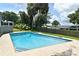 In-ground pool surrounded by a patio and tropical plants at 448 Stonewood Ln, Maitland, FL 32751