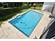 Aerial view of the in-ground pool with backyard playset at 448 Stonewood Ln, Maitland, FL 32751