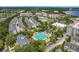 Panoramic aerial view of houses and pool area with mature trees offering shade and charm at 4584 Virginia Dr, Orlando, FL 32814