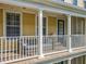 Spacious covered balcony with comfortable seating offering a peaceful outdoor space at 4584 Virginia Dr, Orlando, FL 32814