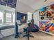 Bedroom featuring unique wall decor and built-in bed at 4584 Virginia Dr, Orlando, FL 32814