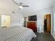 Spacious bedroom with an en-suite bathroom and a walk-in closet, providing ample storage at 4584 Virginia Dr, Orlando, FL 32814