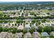 An aerial view captures the home and surrounding neighborhood at 486 Shirley Dr, Apopka, FL 32712