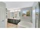 Spacious bathroom with double vanities, a soaking tub, and a separate shower at 486 Shirley Dr, Apopka, FL 32712