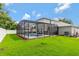 A lovely backyard and enclosed pool area at 486 Shirley Dr, Apopka, FL 32712