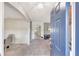 Inviting foyer with neutral walls, plush carpet, and a view into the dining and living spaces at 486 Shirley Dr, Apopka, FL 32712