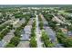 A beautiful aerial view of a tree-lined neighborhood at 486 Shirley Dr, Apopka, FL 32712