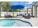 Outdoor patio and pool feature ample seating and covered entertaining area at 486 Shirley Dr, Apopka, FL 32712