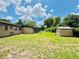 Spacious backyard featuring a well-maintained lawn and additional storage shed at 531 Wigman Dr, Eatonville, FL 32751