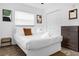 Bright bedroom with a modern bed, dresser, and ample closet space, offering comfort and style at 531 Wigman Dr, Eatonville, FL 32751