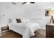 Comfortable bedroom with white linen, accent pillows, and modern decor, providing a relaxing retreat at 531 Wigman Dr, Eatonville, FL 32751