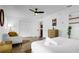 Bright bedroom with white walls, tile floors, and large closet at 531 Wigman Dr, Eatonville, FL 32751