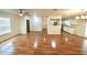 Open floor plan featuring new hardwood flooring and lots of light at 5472 E Grant St, Orlando, FL 32812