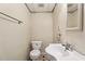 Clean half-bathroom with modern fixtures, crisp design, and functional layout at 5836 Spruce Creek Woods Dr, Port Orange, FL 32127