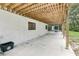 Patio area featuring natural light, brick exterior and a view into the backyard at 5836 Spruce Creek Woods Dr, Port Orange, FL 32127