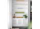 Stylish built-in shelving with glass and rattan front cabinets at 627 N Cherokee Ave, Deland, FL 32724