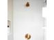 Updated shower showcasing a gold shower head and modern white tiling with a built-in soap shelf at 627 N Cherokee Ave, Deland, FL 32724