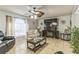 Inviting living room features fireplace, ceiling fan, and plenty of comfortable seating at 636 Milan Dr, Kissimmee, FL 34758
