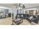 Open concept layout showing living room, dining area, and kitchen, perfect for entertaining at 636 Milan Dr, Kissimmee, FL 34758