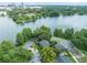 Stunning aerial view of the property showcasing lush landscaping and a nearby lake at 640 S Lake Formosa Dr, Orlando, FL 32803
