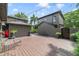 Extensive wooden deck and outdoor area, bordered by lush green landscaping and charming exterior details at 640 S Lake Formosa Dr, Orlando, FL 32803