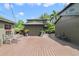 Spacious backyard with a large wooden deck, perfect for outdoor entertaining and relaxation at 640 S Lake Formosa Dr, Orlando, FL 32803