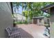 Expansive backyard with wood deck, mature landscaping, and storage shed at 640 S Lake Formosa Dr, Orlando, FL 32803
