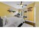 Spacious bedroom features natural light, a work space, and ample closet space at 640 S Lake Formosa Dr, Orlando, FL 32803