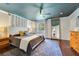 Spacious bedroom featuring a comfortable bed, decorative pillows, and stylish furnishings at 640 S Lake Formosa Dr, Orlando, FL 32803