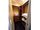 Walk-in closet with custom shelving, drawers, and ample storage space at 640 S Lake Formosa Dr, Orlando, FL 32803