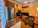 Modern kitchen with stainless steel appliances, granite counters, and ample cabinet space at 640 S Lake Formosa Dr, Orlando, FL 32803